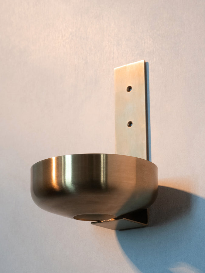 Leif Custom Wall Holder. Holds a single 1.5L Leif bottle. Fabricated from marine grade 316 stainless steel and available in Brass.